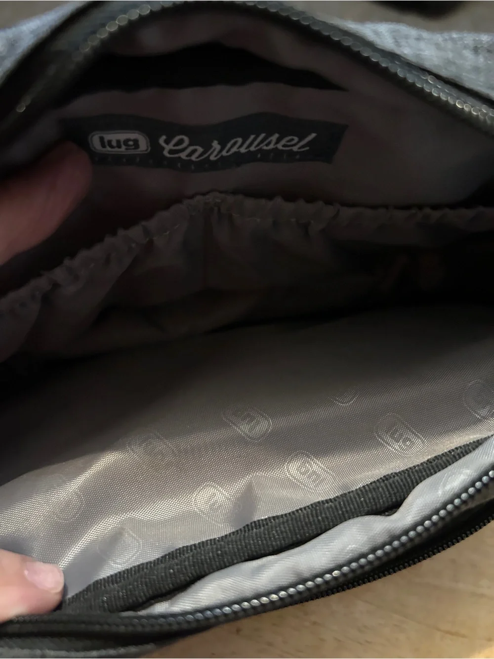 Get organized on the go with this Lug Carousel Crossbody Bag